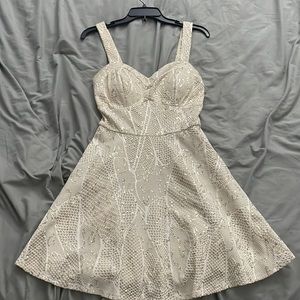 Cream, white, and gold dress